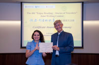 Professor Wagner Present Certificate to Student Ana Clara Oliveira Santos Garner